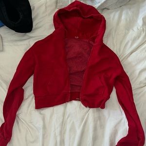 red zip up